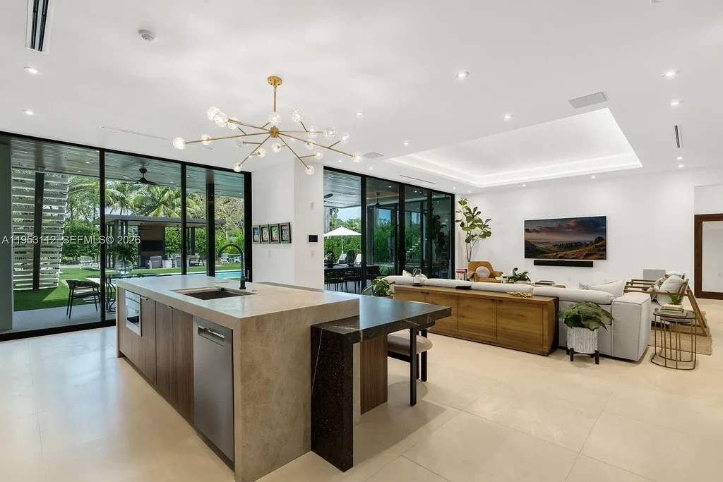 Stunning $7.7 Million Canal-Front Estate Sets a New Benchmark for South Miami Luxury Living 9 6031 SW 88th St canal-front contemporary home in South Miami with resort-style pool