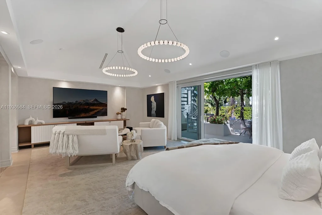 $24.9 Million Exceptional Waterfront Estate Showcases Elite Living in Miami’s Bay Point 11 Waterfront luxury home at 761 Buttonwood Ln in Miami featuring contemporary architecture and private bay frontage