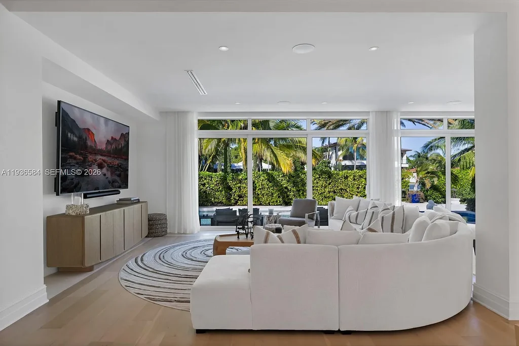 $24.9 Million Exceptional Waterfront Estate Showcases Elite Living in Miami’s Bay Point 7 Waterfront luxury home at 761 Buttonwood Ln in Miami featuring contemporary architecture and private bay frontage