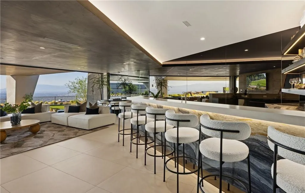 This Architecturally Significant Two-Story Residence Melds With Nevada’s Serene Mountains at $9.3M 12 8 Chisel Crest Ct Showcases a Breathtaking Two Story Home Blending With Nevadas Mountain Landscape 9