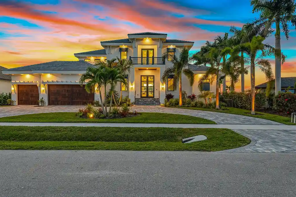 $6.7 Million Brand New Waterfront Masterpiece Offering Direct Gulf Access and Sunset Views on Marco Island 5 920 Iris Ct waterfront home on Marco Island showcasing contemporary architecture and direct Gulf access