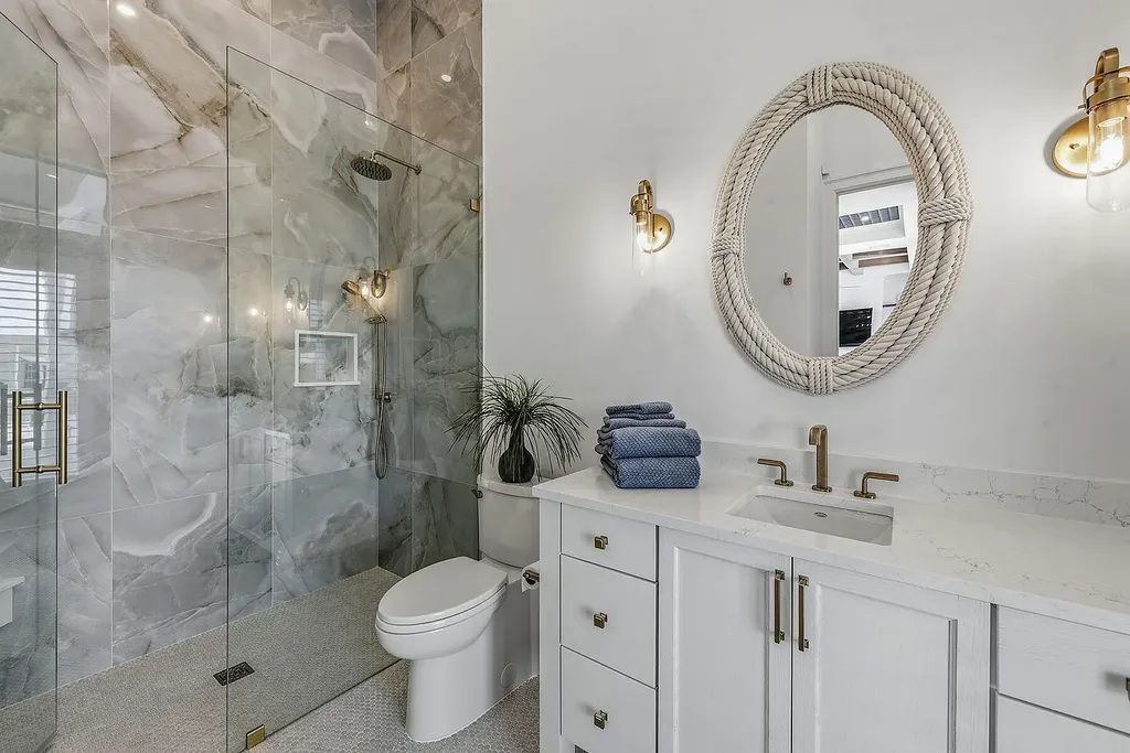 $6.7 Million Brand New Waterfront Masterpiece Offering Direct Gulf Access and Sunset Views on Marco Island 14 920 Iris Ct waterfront home on Marco Island showcasing contemporary architecture and direct Gulf access