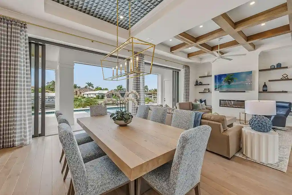 $6.7 Million Brand New Waterfront Masterpiece Offering Direct Gulf Access and Sunset Views on Marco Island 10 920 Iris Ct waterfront home on Marco Island showcasing contemporary architecture and direct Gulf access