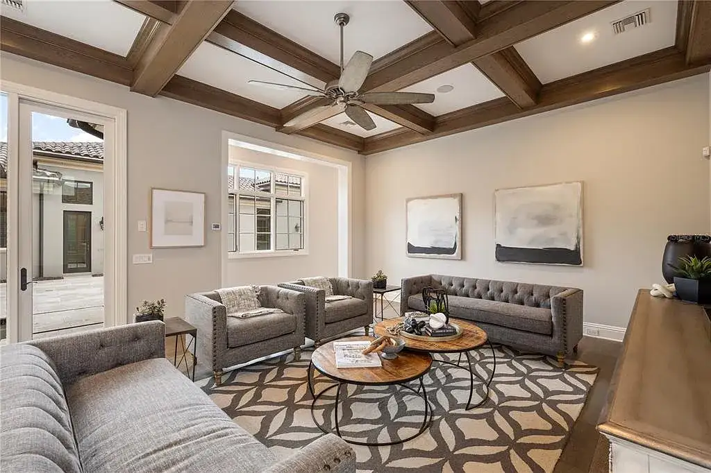 $10.5Million Spectacular Reimagined Luxury Estate in Golden Oak, Orlando 6 Front exterior view of 10012 Hyperion Ln luxury home in Orlando with arched entry and manicured landscaping