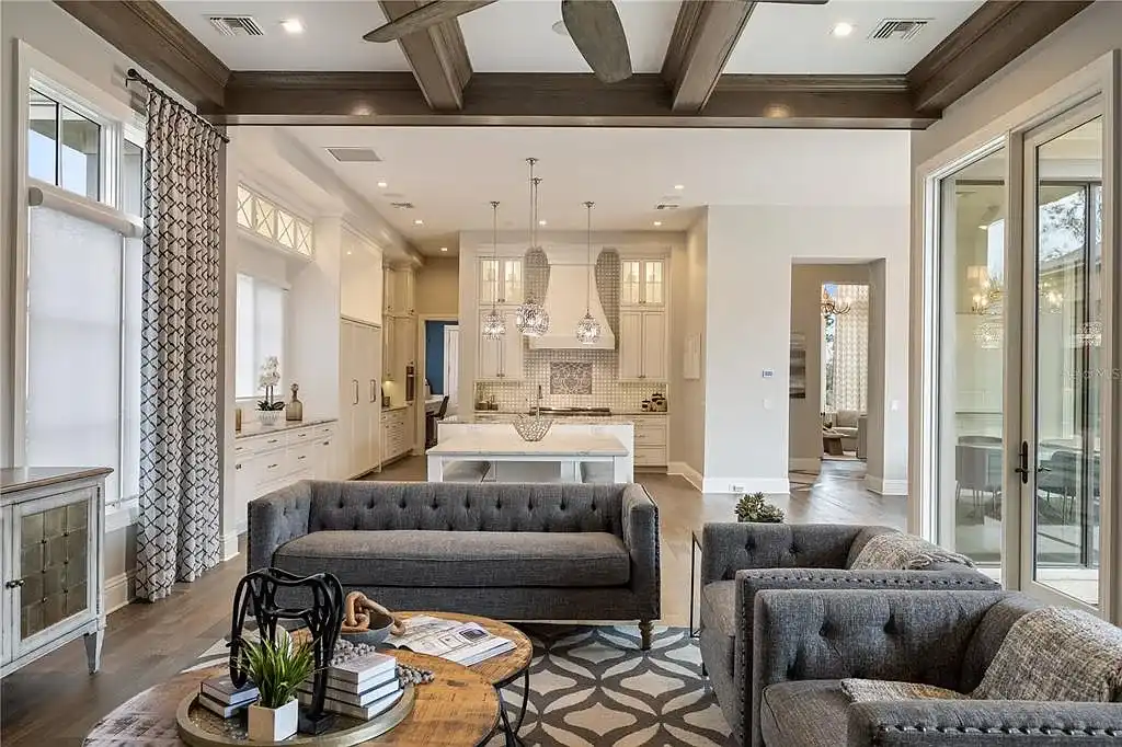 $10.5Million Spectacular Reimagined Luxury Estate in Golden Oak, Orlando 7 Front exterior view of 10012 Hyperion Ln luxury home in Orlando with arched entry and manicured landscaping