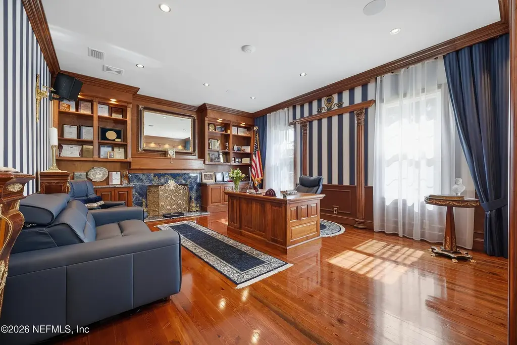 Stunning $7 Million Private Waterfront Estate in Jacksonville Redefines Luxury Living with Nearly Five Acres 14 Front exterior view of luxury waterfront estate in Jacksonville featuring grand neoclassical architecture, private acreage, and resort-style pool at 1370 MOSS CREEK Drive.