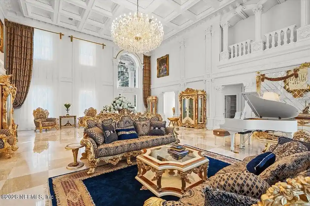 Stunning $7 Million Private Waterfront Estate in Jacksonville Redefines Luxury Living with Nearly Five Acres 16 Front exterior view of luxury waterfront estate in Jacksonville featuring grand neoclassical architecture, private acreage, and resort-style pool at 1370 MOSS CREEK Drive.