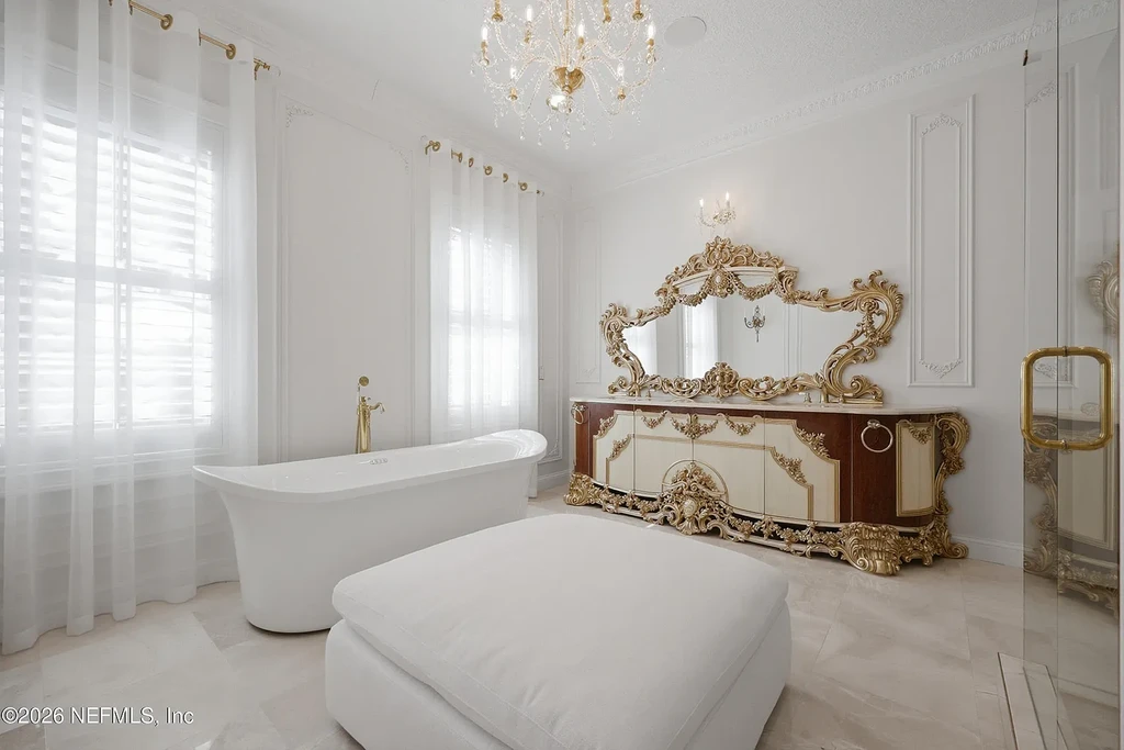 Stunning $7 Million Private Waterfront Estate in Jacksonville Redefines Luxury Living with Nearly Five Acres 11 Front exterior view of luxury waterfront estate in Jacksonville featuring grand neoclassical architecture, private acreage, and resort-style pool at 1370 MOSS CREEK Drive.