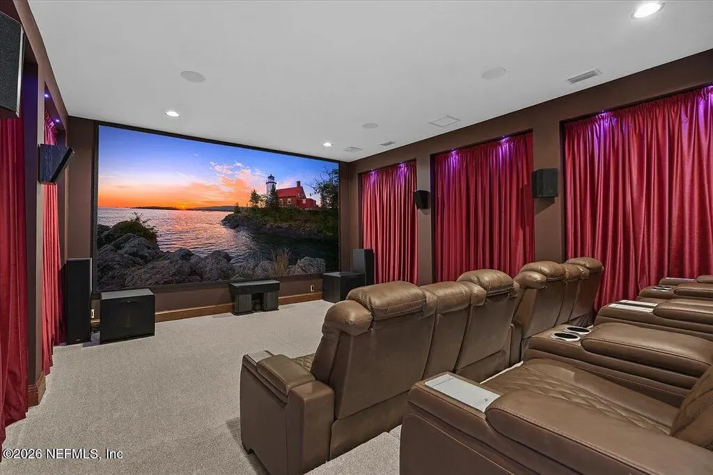 Stunning $7 Million Private Waterfront Estate in Jacksonville Redefines Luxury Living with Nearly Five Acres 15 Front exterior view of luxury waterfront estate in Jacksonville featuring grand neoclassical architecture, private acreage, and resort-style pool at 1370 MOSS CREEK Drive.