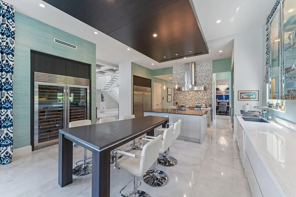 Exquisite $12.8 Million Intracoastal Masterpiece Redefining Elite Waterfront Living in Palm Beach Gardens 8 Aerial view of 14646 Watermark Way showcasing private dock and direct Intracoastal Waterway access