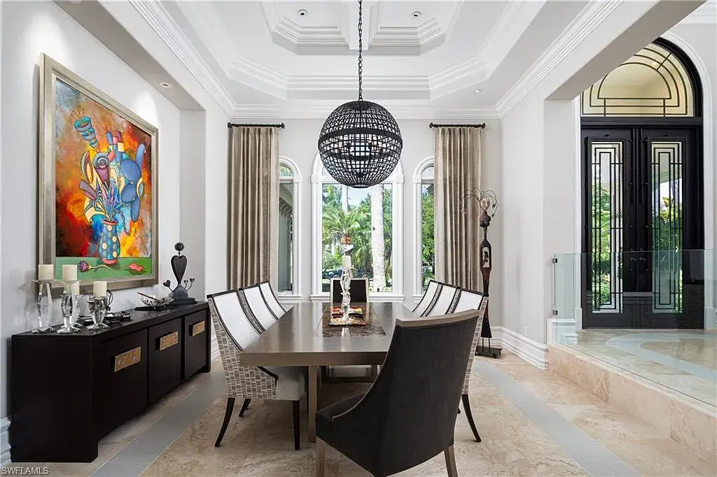 A Fully Reimagined Grey Oaks Estate in Naples Lists for $10 Million With Water and Fairway Views 10 State-of-the-art kitchen with dual islands and Wolf appliances inside 2145 Canna Way in Naples