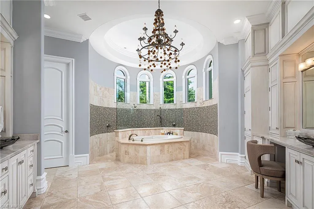 A Fully Reimagined Grey Oaks Estate in Naples Lists for $10 Million With Water and Fairway Views 13 State-of-the-art kitchen with dual islands and Wolf appliances inside 2145 Canna Way in Naples