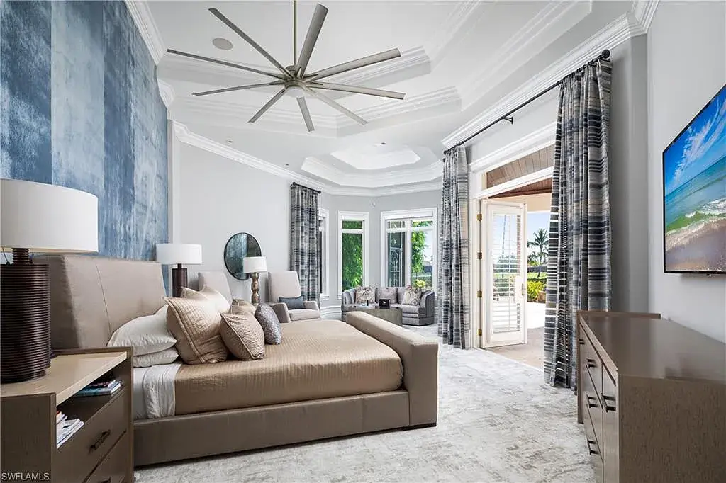 A Fully Reimagined Grey Oaks Estate in Naples Lists for $10 Million With Water and Fairway Views 12 State-of-the-art kitchen with dual islands and Wolf appliances inside 2145 Canna Way in Naples