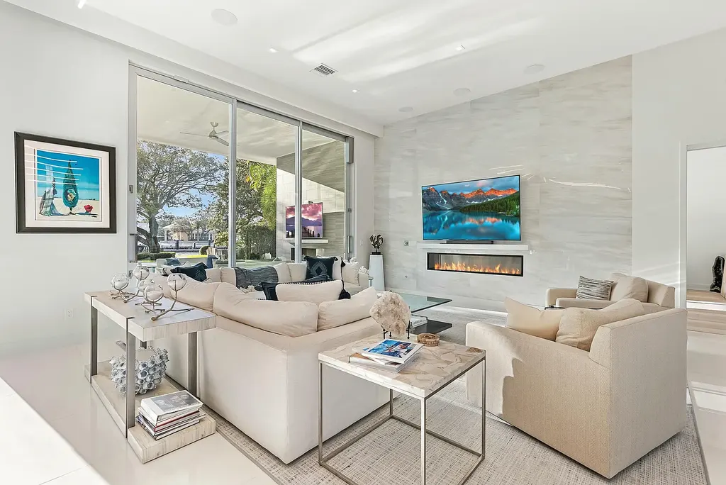 $12.8 Million Intracoastal Estate Redefines Waterfront Luxury with Private Dock, Smart Home Innovation, and Resort-Style Living 7 Luxury waterfront estate at 2162 Radnor Road, a stunning Home in North Palm Beach for sale featuring Intracoastal views, private dock, resort-style pool, and contemporary coastal architecture.