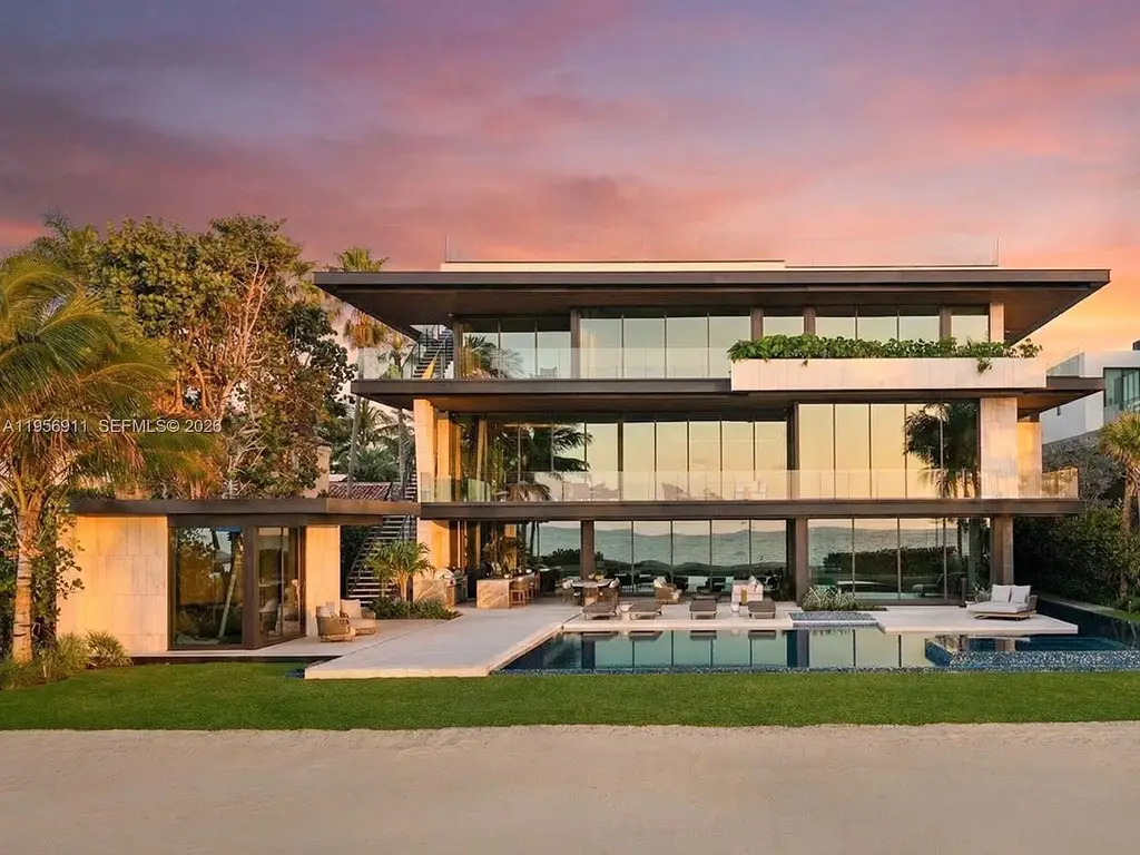 $88.5 Million Ultra-Modern Golden Beach Oceanfront Mansion Showcases Record-Breaking Design 5 Luxury oceanfront mansion in Golden Beach featuring modern stone façade, infinity-edge pools, rooftop spa, expansive glass walls, and panoramic Atlantic Ocean views