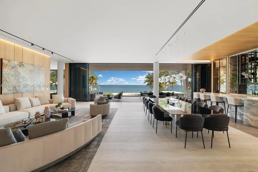 $88.5 Million Ultra-Modern Golden Beach Oceanfront Mansion Showcases Record-Breaking Design 6 Luxury oceanfront mansion in Golden Beach featuring modern stone façade, infinity-edge pools, rooftop spa, expansive glass walls, and panoramic Atlantic Ocean views