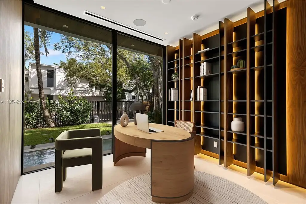 Spectacular $18 Million Ultra-Luxury New Construction Estate in Miami Showcases Iconic Modern Design 9 Modern ultra-luxury estate at 3210 Coacoochee St in Miami featuring contemporary architecture, expansive glass walls, private terraces, resort-style pool and spa, and landscaped tropical outdoor living areas.