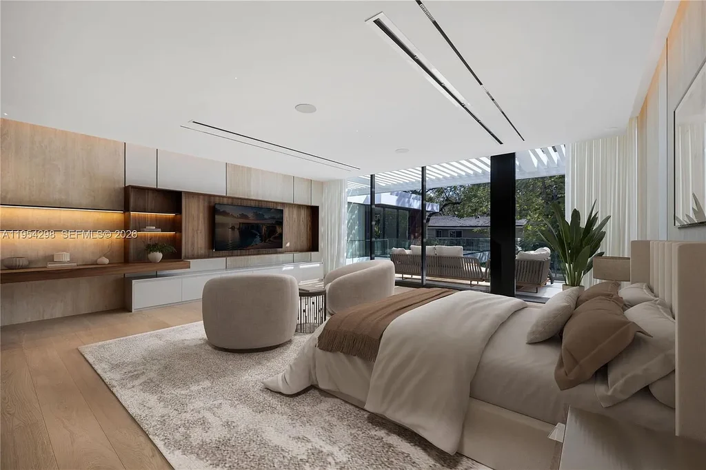 Spectacular $18 Million Ultra-Luxury New Construction Estate in Miami Showcases Iconic Modern Design 12 Modern ultra-luxury estate at 3210 Coacoochee St in Miami featuring contemporary architecture, expansive glass walls, private terraces, resort-style pool and spa, and landscaped tropical outdoor living areas.