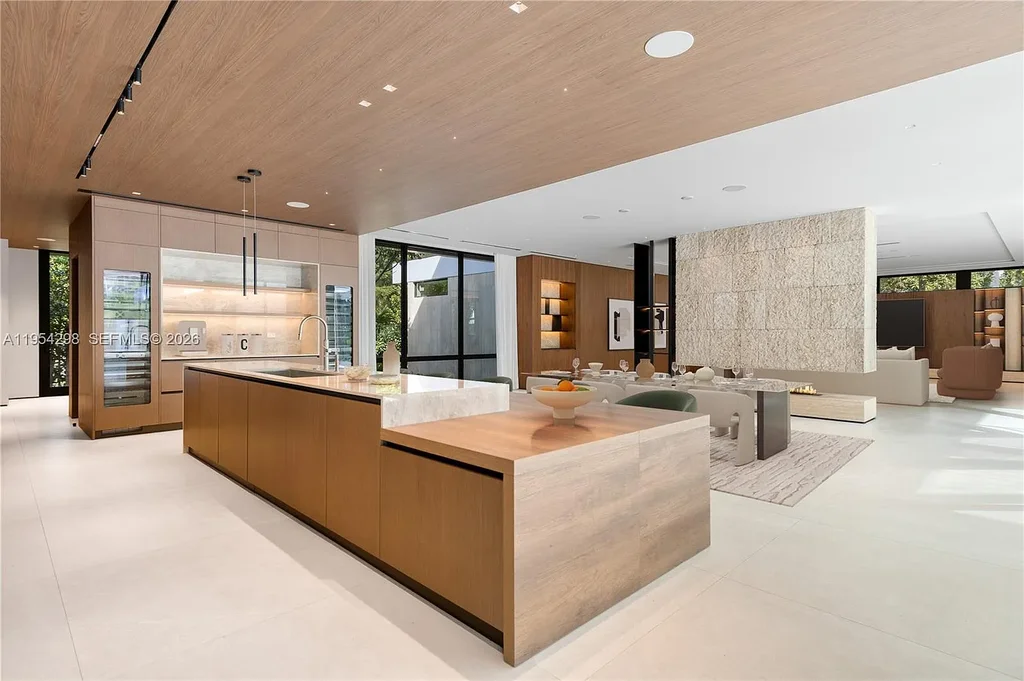 Spectacular $18 Million Ultra-Luxury New Construction Estate in Miami Showcases Iconic Modern Design 8 Modern ultra-luxury estate at 3210 Coacoochee St in Miami featuring contemporary architecture, expansive glass walls, private terraces, resort-style pool and spa, and landscaped tropical outdoor living areas.