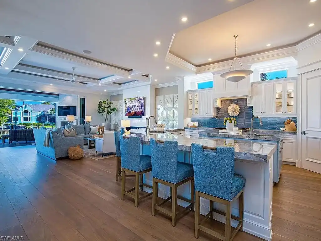 $17.9 Million Turnkey Waterfront Estate Offers Exceptional Living in Port Royal, Naples 9 Front exterior view of 3243 Gin LN, a $17.9 million waterfront estate in Port Royal, Naples