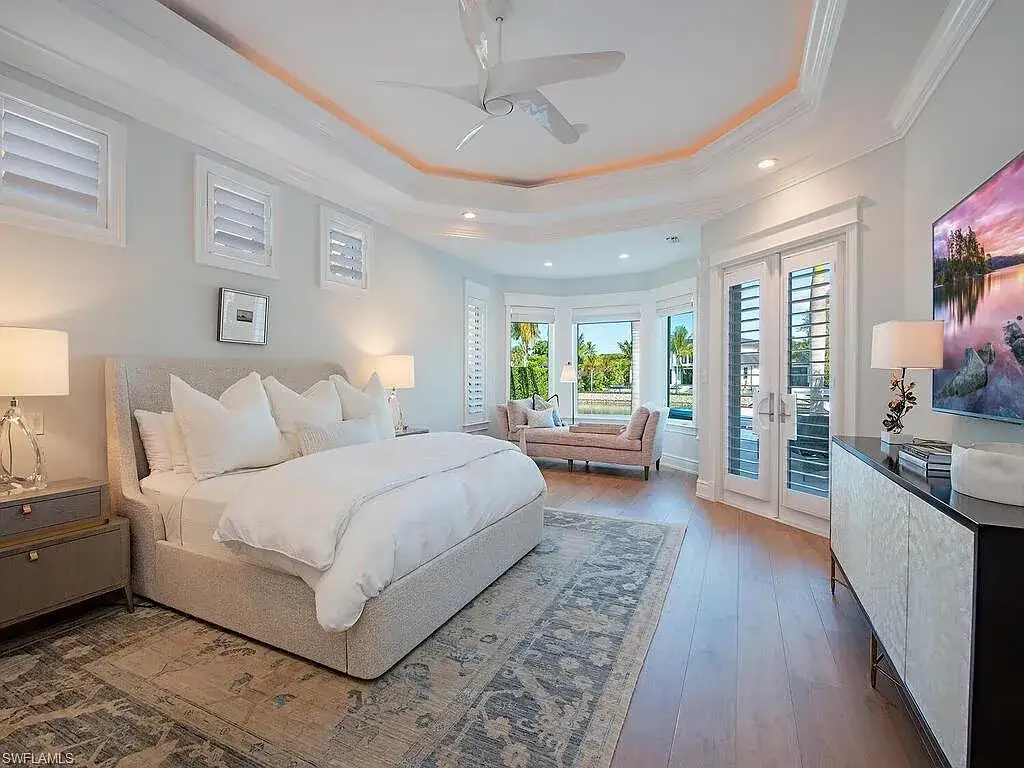 $17.9 Million Turnkey Waterfront Estate Offers Exceptional Living in Port Royal, Naples 11 Front exterior view of 3243 Gin LN, a $17.9 million waterfront estate in Port Royal, Naples