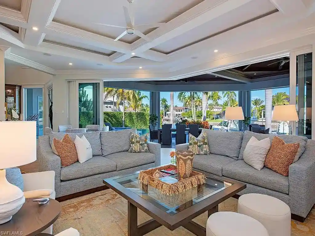 $17.9 Million Turnkey Waterfront Estate Offers Exceptional Living in Port Royal, Naples 6 Front exterior view of 3243 Gin LN, a $17.9 million waterfront estate in Port Royal, Naples