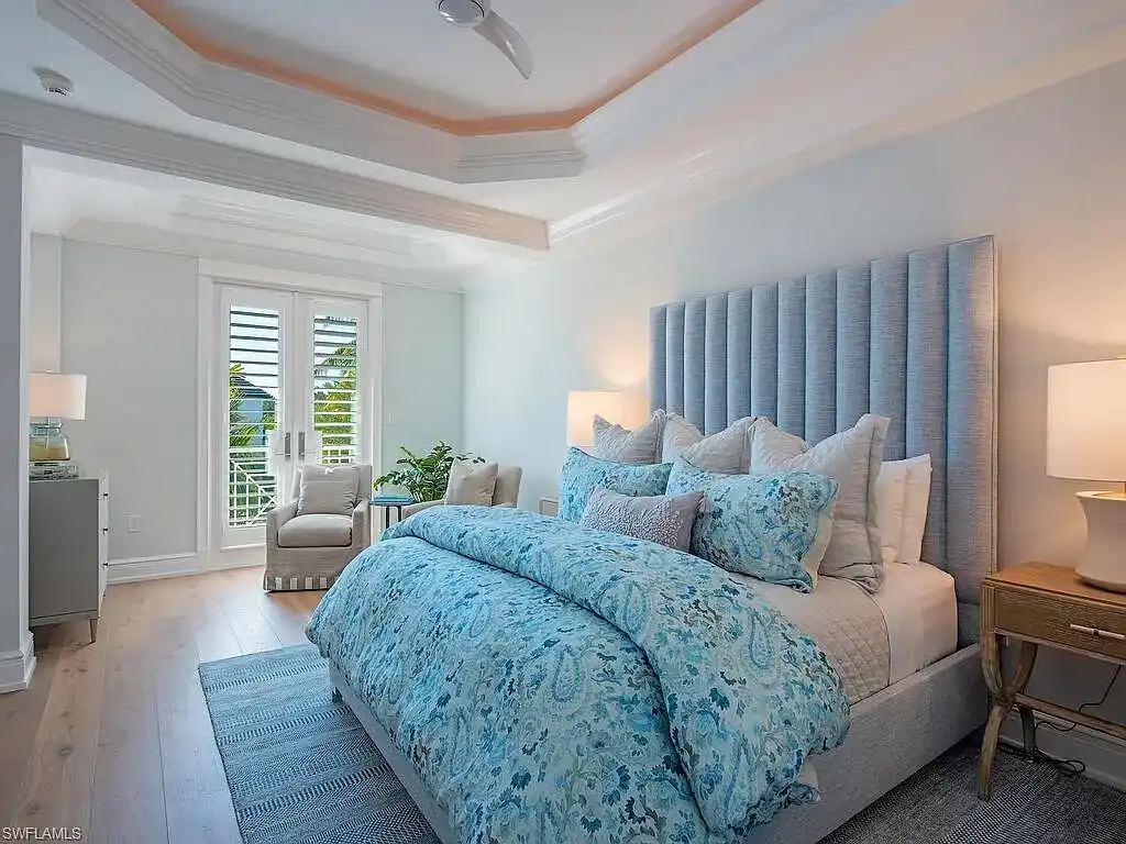 $17.9 Million Turnkey Waterfront Estate Offers Exceptional Living in Port Royal, Naples 13 Front exterior view of 3243 Gin LN, a $17.9 million waterfront estate in Port Royal, Naples