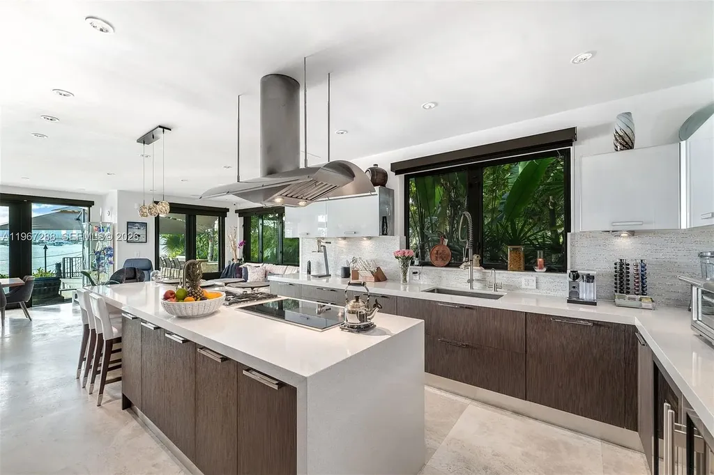 Luxury Open-Bay Waterfront Estate in Miami Beach Listed for $29.5 Million With Resort-Style Design and Skyline Views 9 34 W Di Lido Dr waterfront estate with open-bay views and Mediterranean architecture in Miami Beach