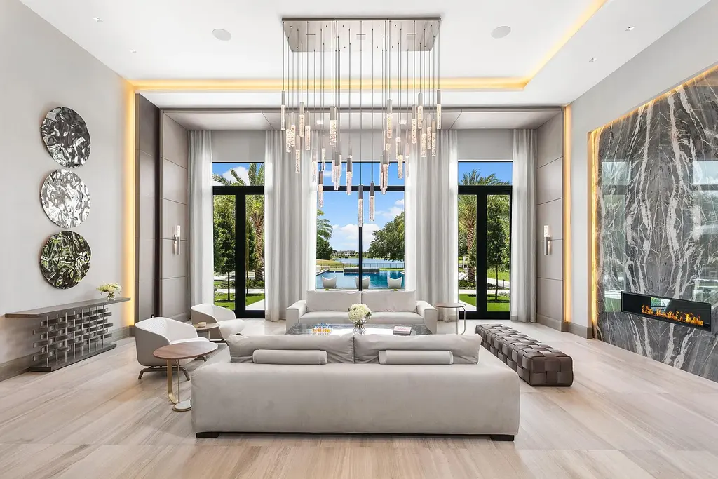 $55 Million Lakefront Estate in Delray Beach’s Stone Creek Ranch Showcases Resort-Style Luxury and Rare Double-Lot Privacy 6 Luxury lakefront estate exterior at 16191 Quiet Vista Circle in Delray Beach featuring expansive landscaping and contemporary architecture