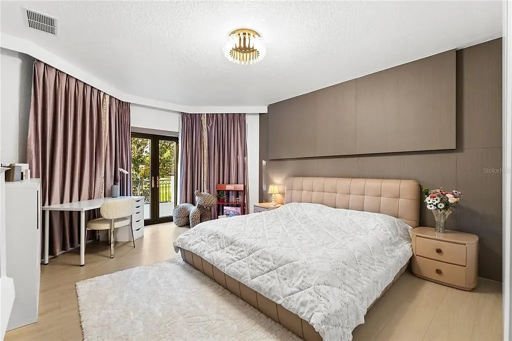 $5.7 Million Newly Remodeled Isleworth Golf Estate Showcases Spectacular Resort-Style Luxury in Windermere 12 Aerial view of 5186 Vardon Dr luxury estate showcasing golf course frontage and resort-style outdoor amenities