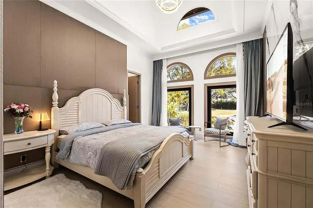 $5.7 Million Newly Remodeled Isleworth Golf Estate Showcases Spectacular Resort-Style Luxury in Windermere 15 Aerial view of 5186 Vardon Dr luxury estate showcasing golf course frontage and resort-style outdoor amenities