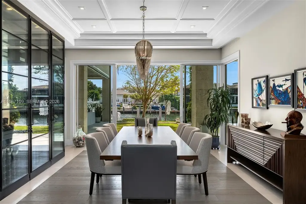 $38 Million Spectacular Waterfront Estate Redefines Coastal Mediterranean Luxury in Coral Gables 10 550 Marquesa Dr waterfront estate in Coral Gables featuring Coastal Mediterranean architecture, infinity pool, private canal dock, and luxury outdoor living spaces.