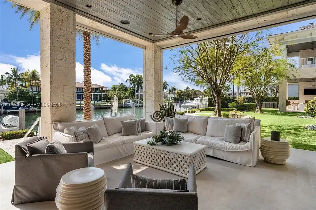 $38 Million Spectacular Waterfront Estate Redefines Coastal Mediterranean Luxury in Coral Gables 15 550 Marquesa Dr waterfront estate in Coral Gables featuring Coastal Mediterranean architecture, infinity pool, private canal dock, and luxury outdoor living spaces.