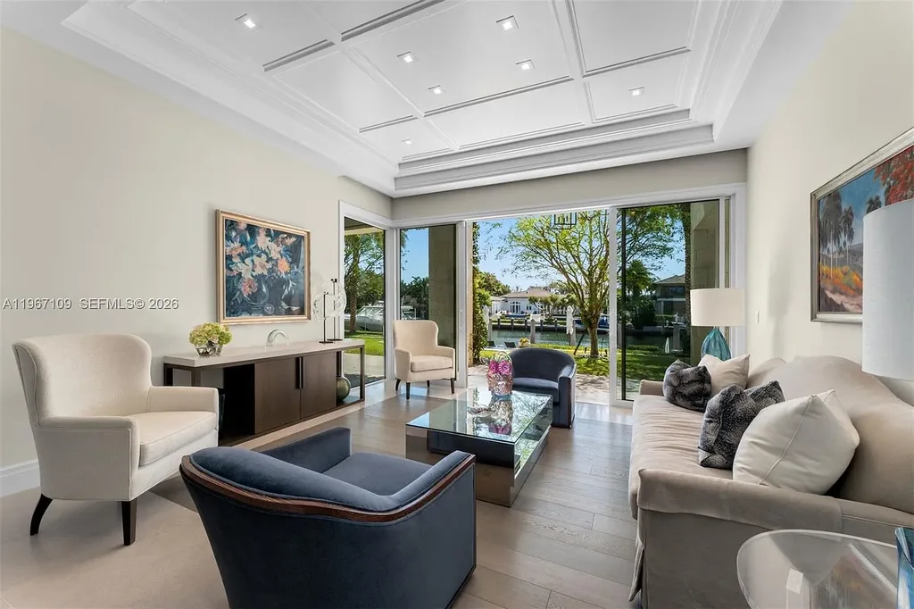 $38 Million Spectacular Waterfront Estate Redefines Coastal Mediterranean Luxury in Coral Gables 7 550 Marquesa Dr waterfront estate in Coral Gables featuring Coastal Mediterranean architecture, infinity pool, private canal dock, and luxury outdoor living spaces.