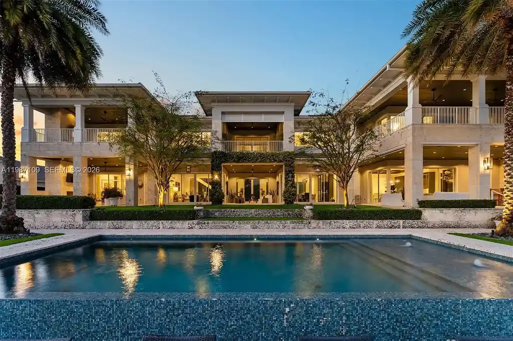 $38 Million Spectacular Waterfront Estate Redefines Coastal Mediterranean Luxury in Coral Gables 6 550 Marquesa Dr waterfront estate in Coral Gables featuring Coastal Mediterranean architecture, infinity pool, private canal dock, and luxury outdoor living spaces.