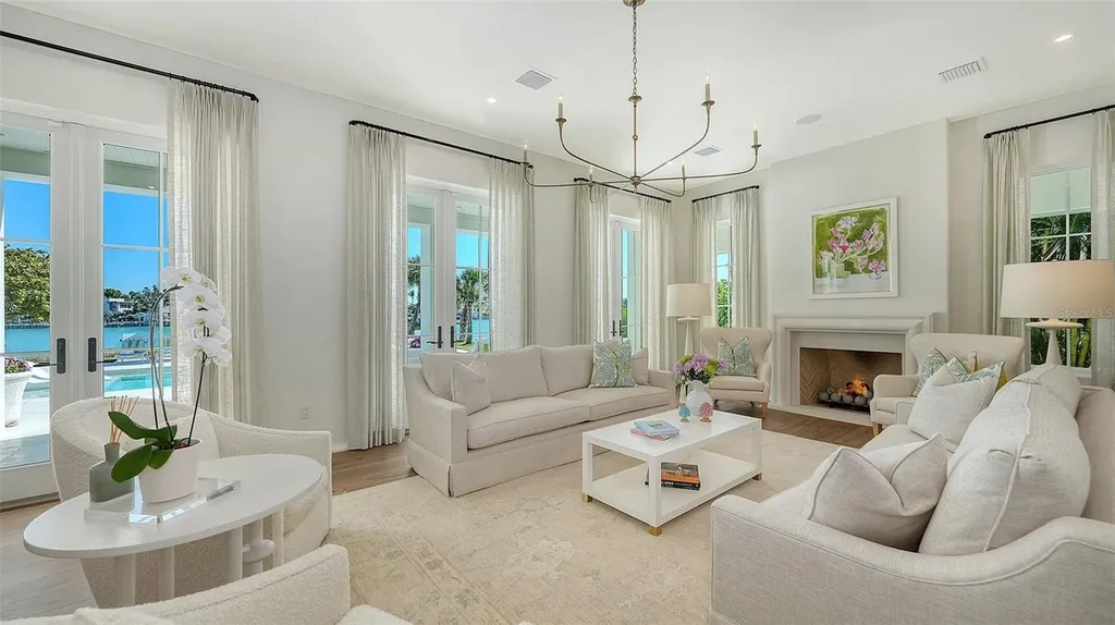 $13.8 Million Spectacular Gulf-Front Waterfront Estate Unveils Private Beach Luxury in Exclusive Longboat Key Enclave 7 70 Lighthouse Point Dr luxury waterfront estate with heated pool and private Gulf beach in Longboat Key Florida