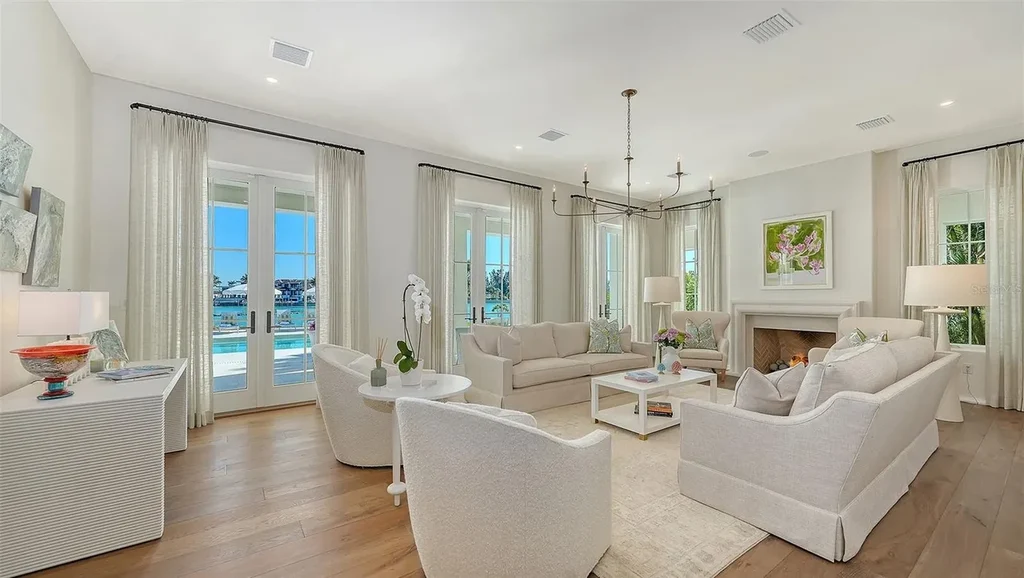 $13.8 Million Spectacular Gulf-Front Waterfront Estate Unveils Private Beach Luxury in Exclusive Longboat Key Enclave 6 70 Lighthouse Point Dr luxury waterfront estate with heated pool and private Gulf beach in Longboat Key Florida