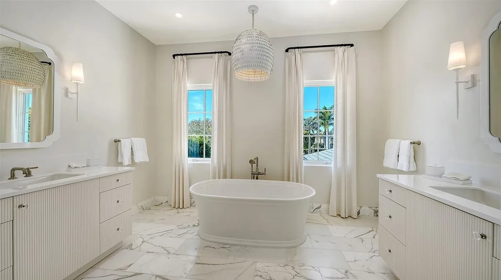 $13.8 Million Spectacular Gulf-Front Waterfront Estate Unveils Private Beach Luxury in Exclusive Longboat Key Enclave 15 70 Lighthouse Point Dr luxury waterfront estate with heated pool and private Gulf beach in Longboat Key Florida