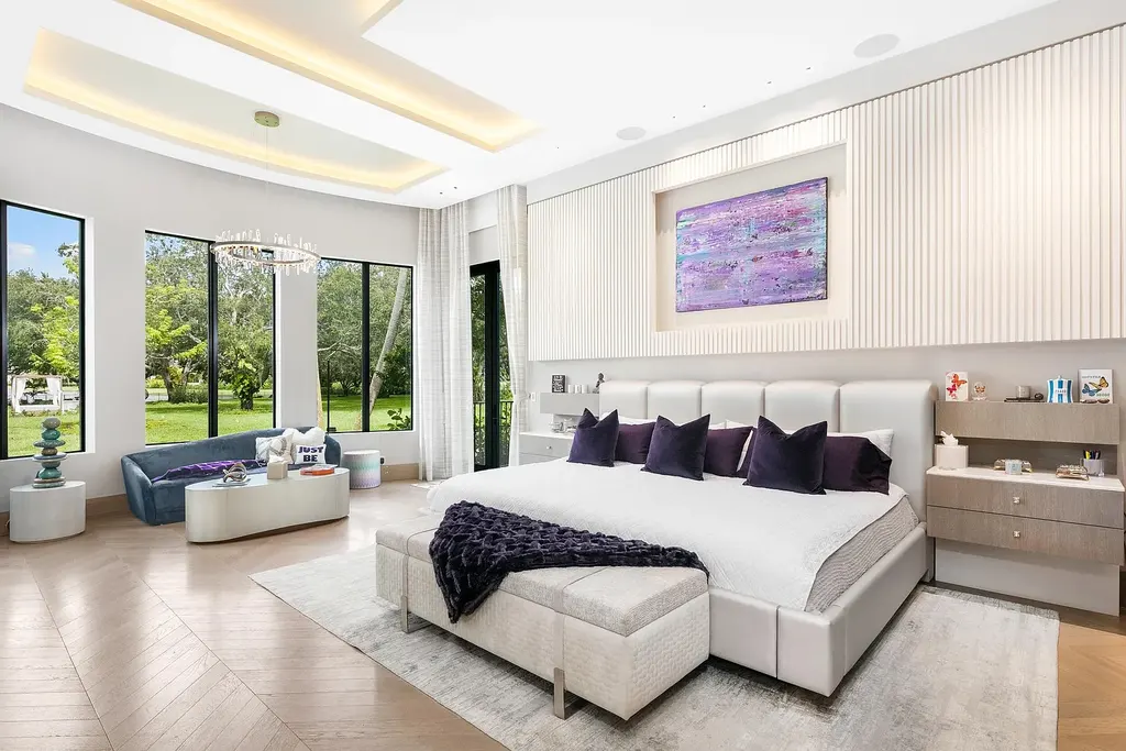 $55 Million Lakefront Estate in Delray Beach’s Stone Creek Ranch Showcases Resort-Style Luxury and Rare Double-Lot Privacy 15 Luxury lakefront estate exterior at 16191 Quiet Vista Circle in Delray Beach featuring expansive landscaping and contemporary architecture