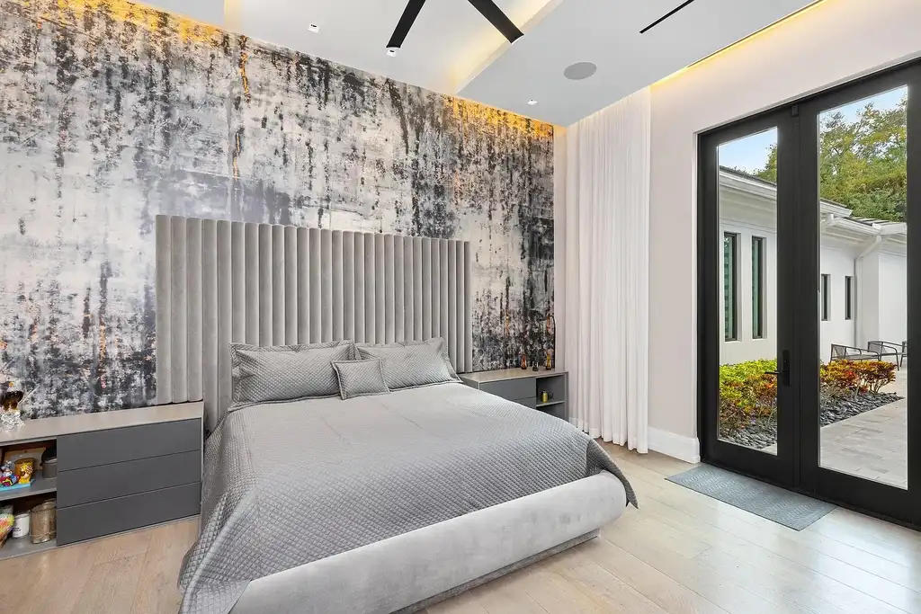 $55 Million Lakefront Estate in Delray Beach’s Stone Creek Ranch Showcases Resort-Style Luxury and Rare Double-Lot Privacy 13 Luxury lakefront estate exterior at 16191 Quiet Vista Circle in Delray Beach featuring expansive landscaping and contemporary architecture