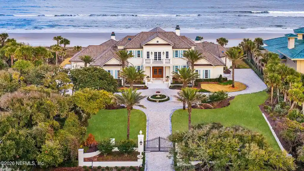$19.8 Million Stunning Oceanfront Estate in Ponte Vedra Beach Showcases Exclusive Design and Ultimate Coastal Luxury 5 Front elevation of 993 PONTE VEDRA Boulevard showcasing gated entrance and landscaped driveway