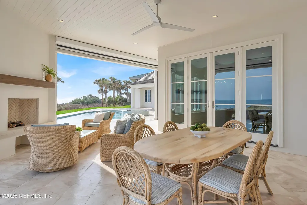 $19.8 Million Stunning Oceanfront Estate in Ponte Vedra Beach Showcases Exclusive Design and Ultimate Coastal Luxury 17 Front elevation of 993 PONTE VEDRA Boulevard showcasing gated entrance and landscaped driveway