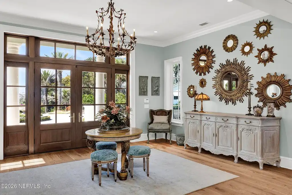 $19.8 Million Stunning Oceanfront Estate in Ponte Vedra Beach Showcases Exclusive Design and Ultimate Coastal Luxury 6 Front elevation of 993 PONTE VEDRA Boulevard showcasing gated entrance and landscaped driveway