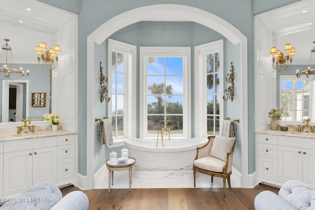 $19.8 Million Stunning Oceanfront Estate in Ponte Vedra Beach Showcases Exclusive Design and Ultimate Coastal Luxury 15 Front elevation of 993 PONTE VEDRA Boulevard showcasing gated entrance and landscaped driveway