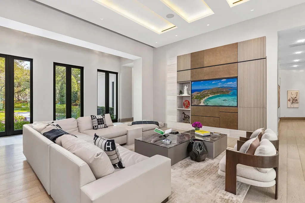 $55 Million Lakefront Estate in Delray Beach’s Stone Creek Ranch Showcases Resort-Style Luxury and Rare Double-Lot Privacy 8 Luxury lakefront estate exterior at 16191 Quiet Vista Circle in Delray Beach featuring expansive landscaping and contemporary architecture