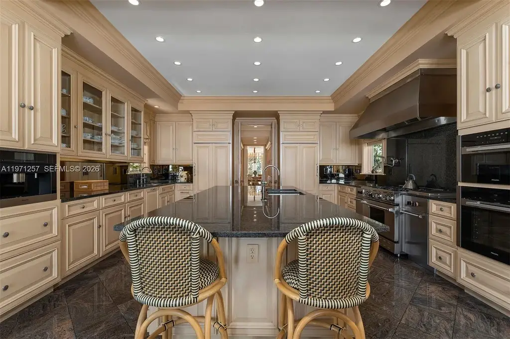 $52.5 Million Spectacular Private Island Bayfront Estate in Coral Gables Showcases Ultimate Waterfront Luxury 9 10 Tahiti Beach Island Rd luxury bayfront mansion in Coral Gables with private dock, resort-style pool, and panoramic Biscayne Bay views