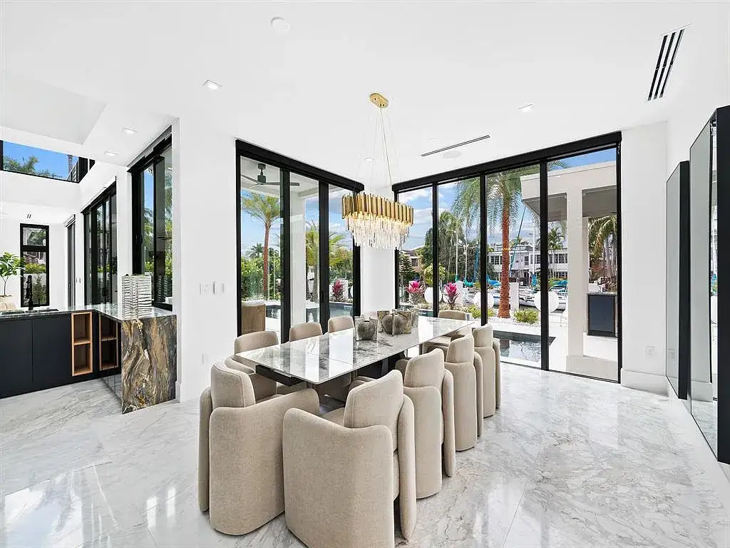Stunning $10.2 Million New Construction Waterfront Mansion in Fort Lauderdale Hits the Market 11 Luxury waterfront home at 111 Fiesta Way in Fort Lauderdale with canal frontage, pool, and modern three-story architecture.