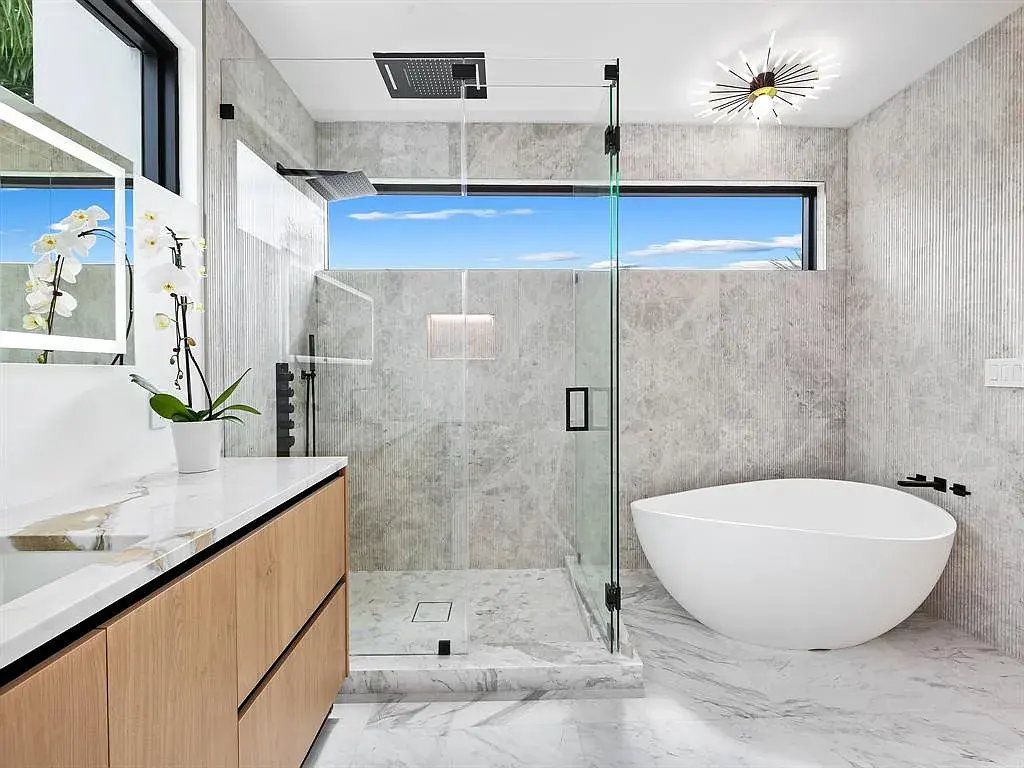 Stunning $10.2 Million New Construction Waterfront Mansion in Fort Lauderdale Hits the Market 14 Luxury waterfront home at 111 Fiesta Way in Fort Lauderdale with canal frontage, pool, and modern three-story architecture.