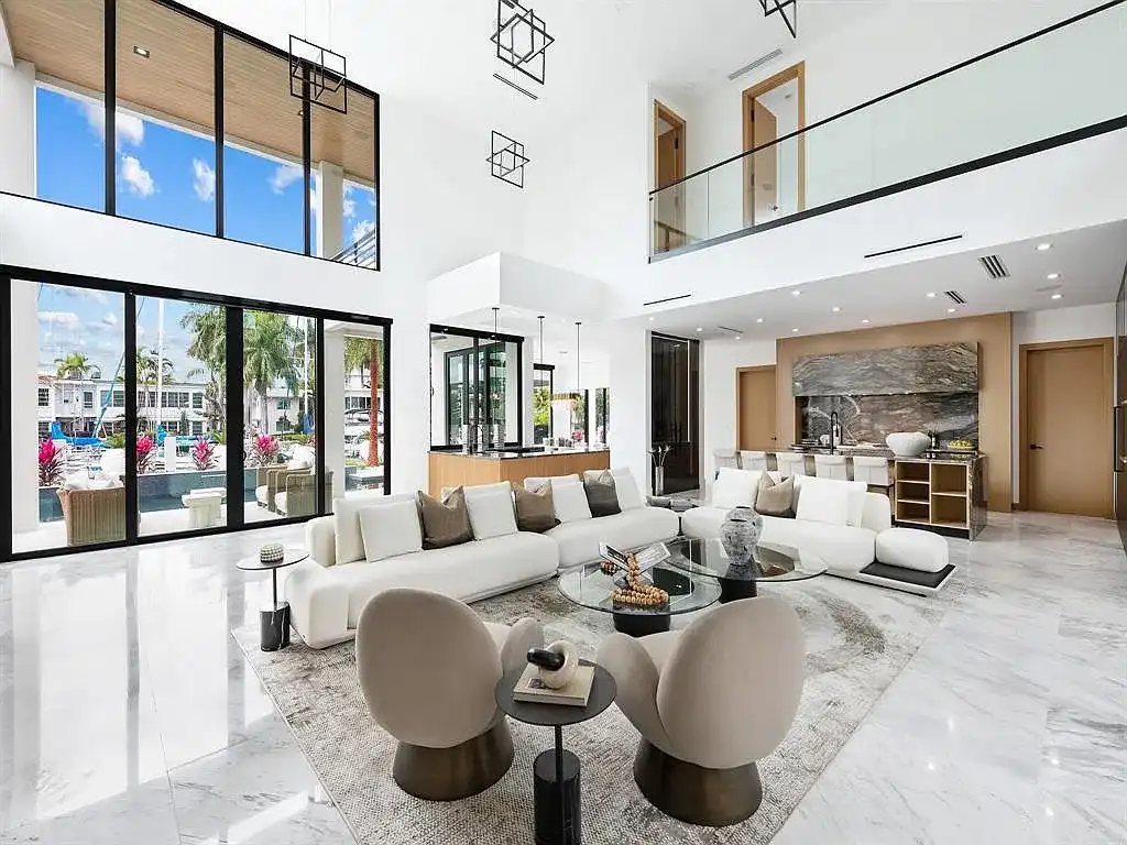 Stunning $10.2 Million New Construction Waterfront Mansion in Fort Lauderdale Hits the Market 8 Luxury waterfront home at 111 Fiesta Way in Fort Lauderdale with canal frontage, pool, and modern three-story architecture.