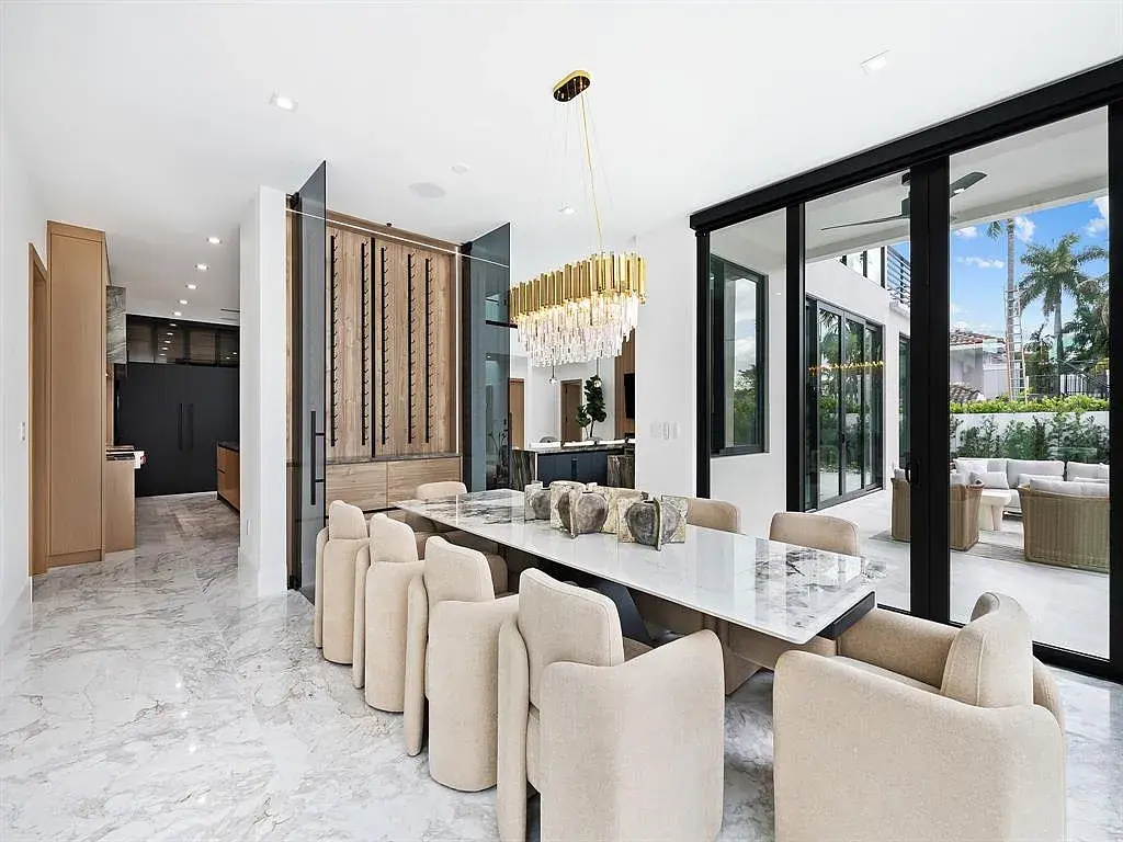 Stunning $10.2 Million New Construction Waterfront Mansion in Fort Lauderdale Hits the Market 10 Luxury waterfront home at 111 Fiesta Way in Fort Lauderdale with canal frontage, pool, and modern three-story architecture.